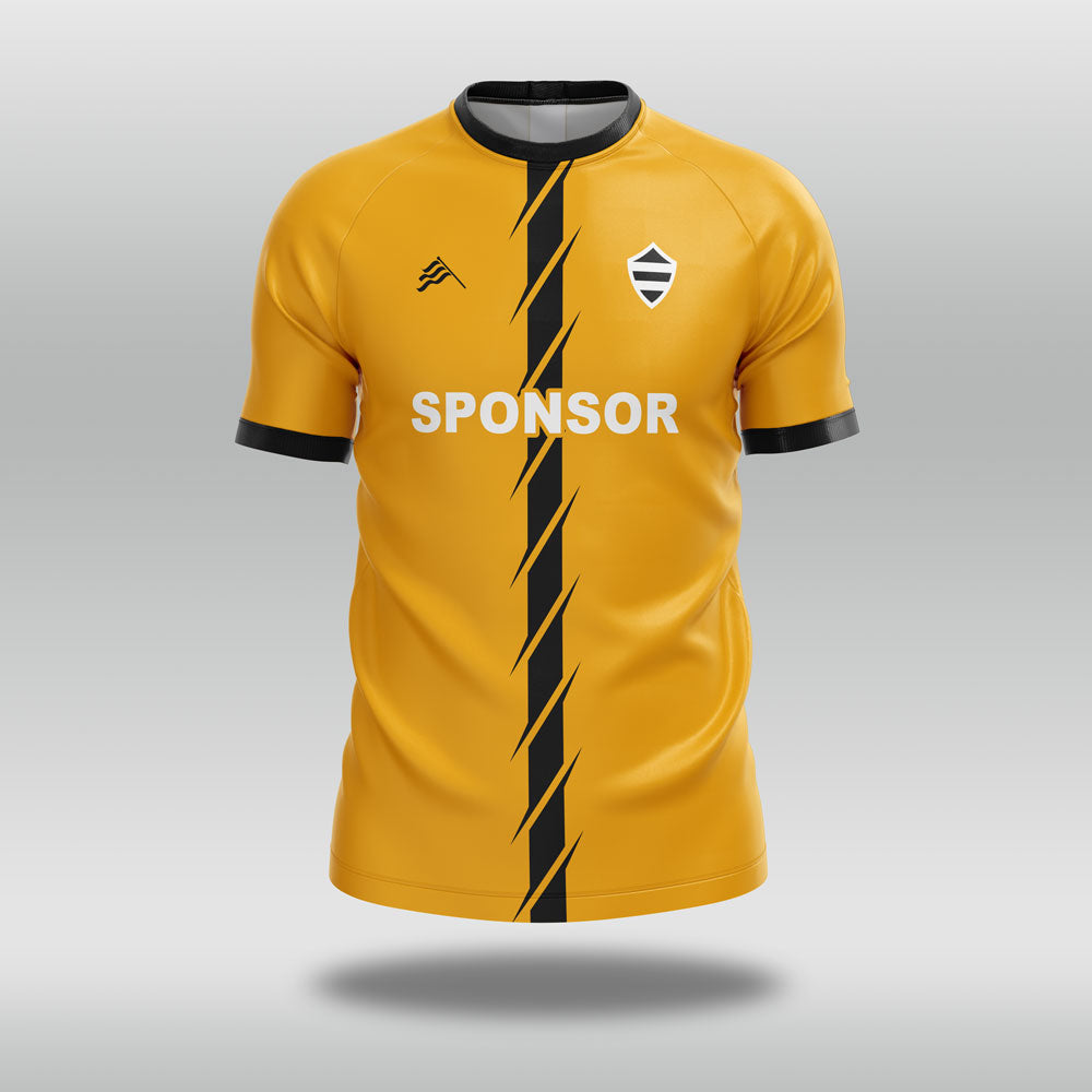 Yellow football shirt with black accents and a sponsor logo on a gray background
