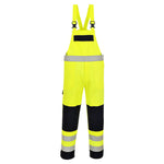 A Portwest - Hi-Vis Multi-Norm Bib and Brace with black reflective stripes and a front zip pocket.