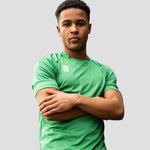 Model wearing the Stuart Surridge Dual Games Shirt - Emerald