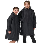 Two models wearing the kids all weather robe in black