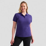 model wearing Uneek Ladies Active Cotton Poloshirt UC115