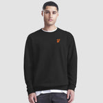 Model wearing the Winsford ASC Premium Sweat – Adults JH030 in Jet black