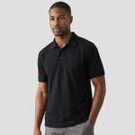 Model wearing the Orn Eagle Polo Shirt 1150 in black