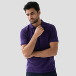 Model wearing the Orn Eagle Polo Shirt 1150 in Purple