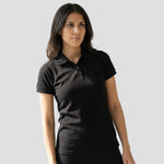 Model wearing the Orn Ladies Eagle Polo Shirt 1160 in  Black
