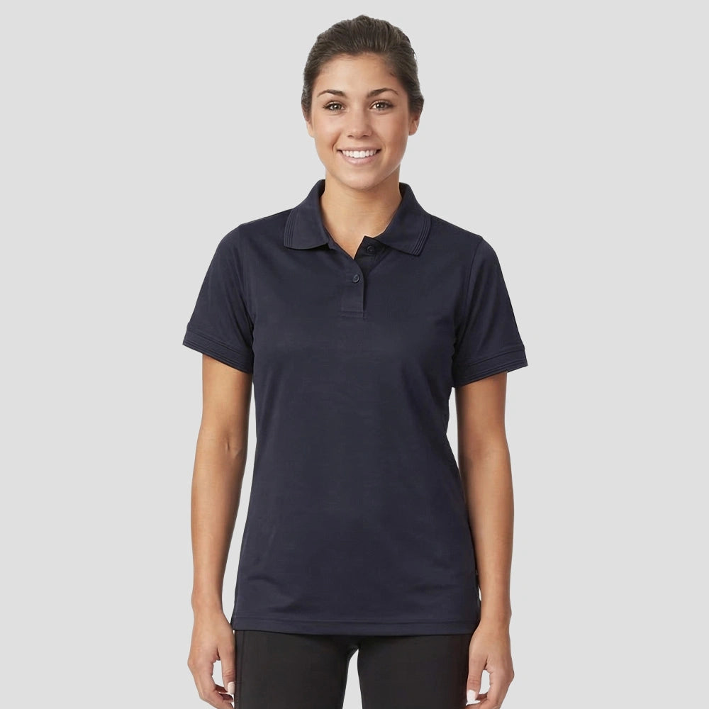 Model wearing the Orn Ladies Oriole Wicking Polo Shirt 1196 in Navy