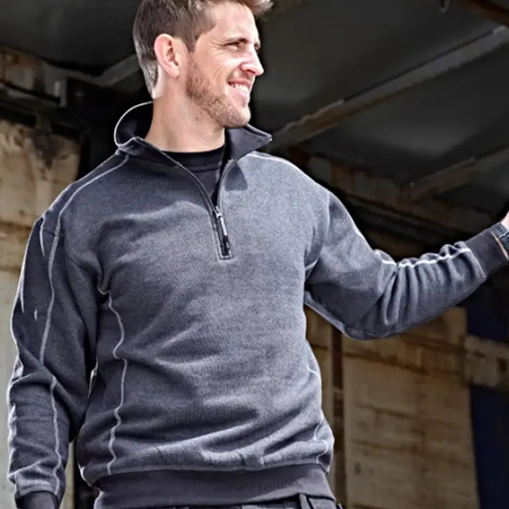 Lifestyle shot of Model wearing the Orn Grouse Quarter Zip Sweatshirt 1270 in Graphite Grey