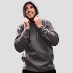 Model wearing the Orn Owl Hoodie 1280 in Graphite Grey