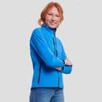A model wearing a Russell Ladies Soft Shell Jacket