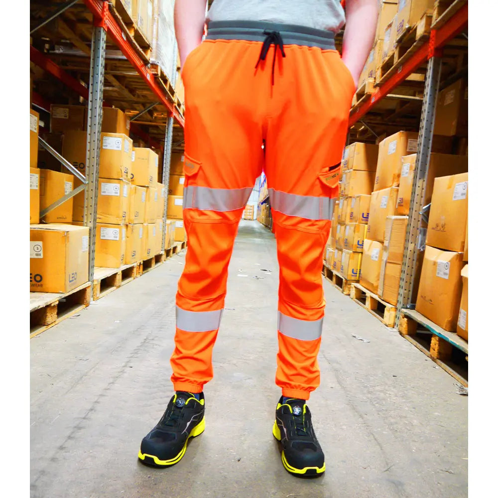 Hawkridge Stretch Performance Trousers in orange worn by male model
