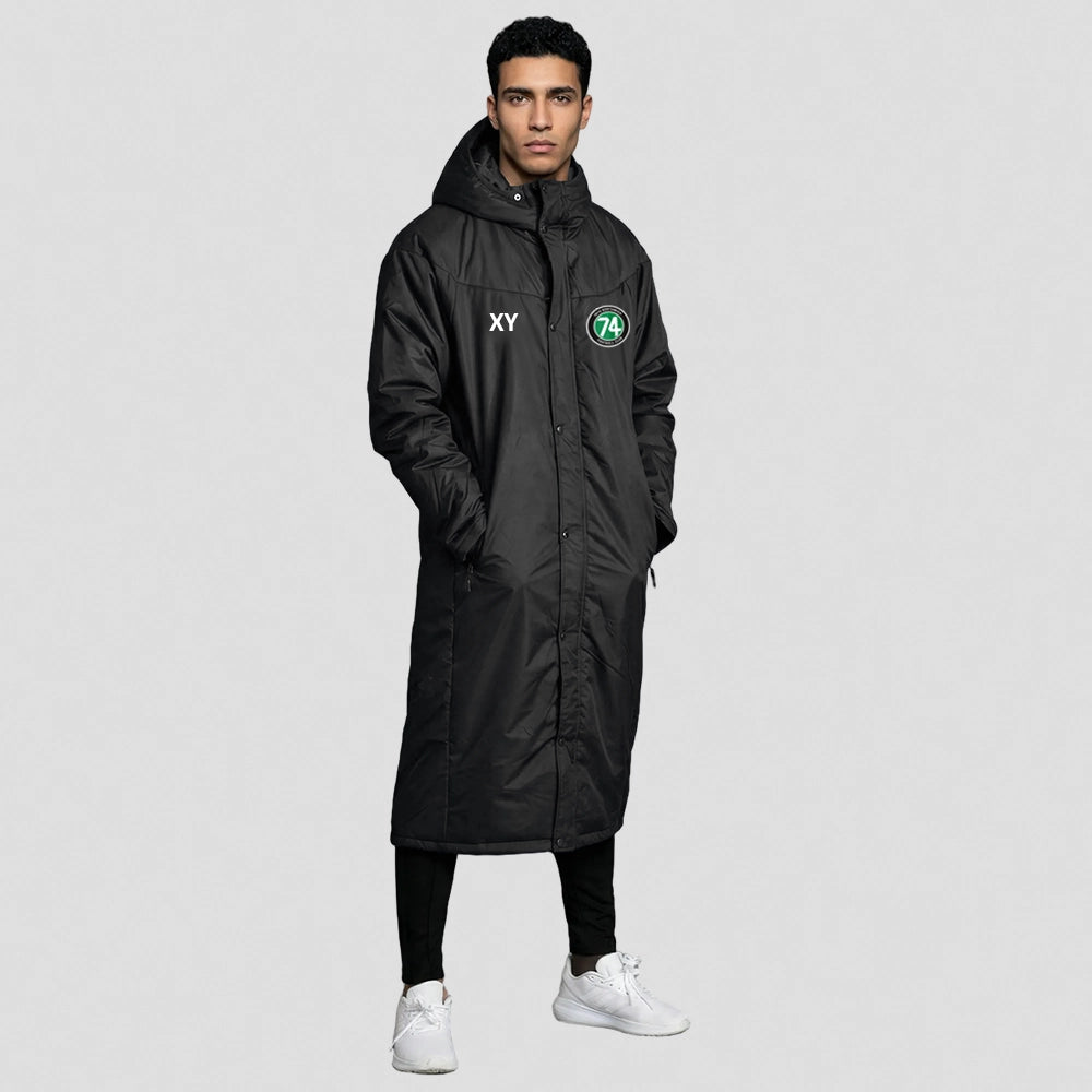 model wearing 1874 Northwich JFC Touchline Coat