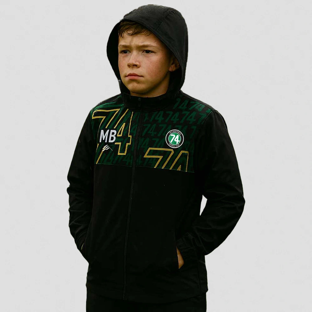 junior model wearing 1874 Northwich JFC Rain Jacket – Junior