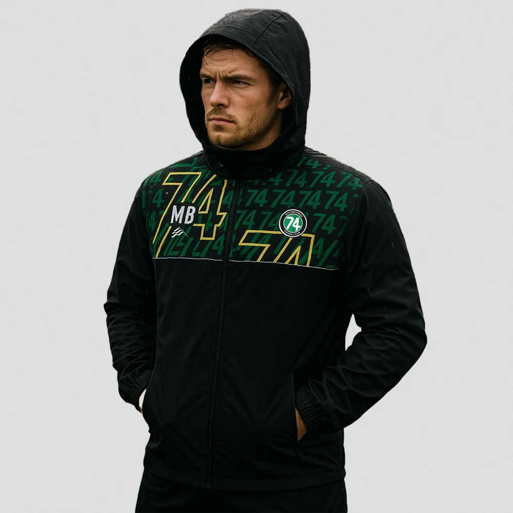 model wearing 1874 Northwich JFC Rain Jacket – Adult