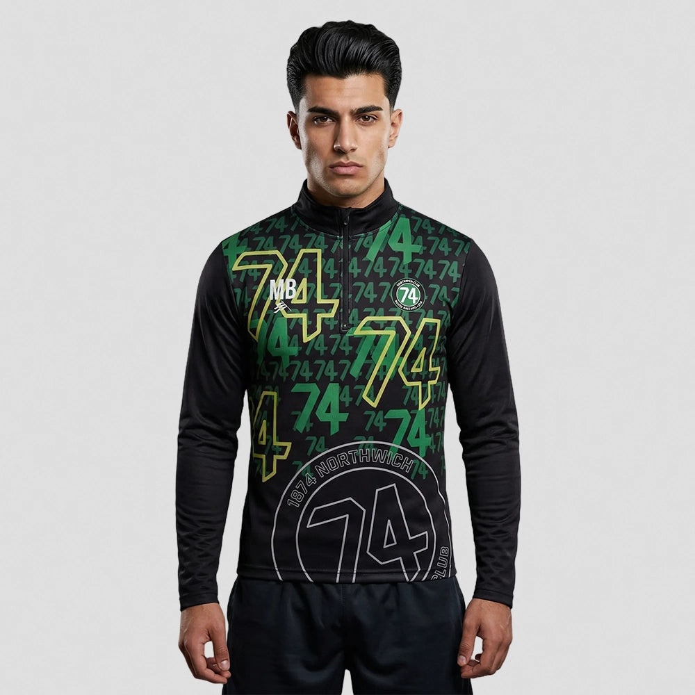 model wearing 1874 Northwich JFC 1/4 Zip Rain Training Top – Adult