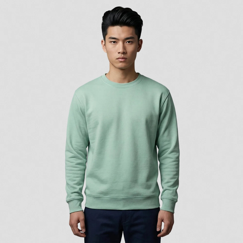 model wearing Authentic Sweatshirt (Colours) in eucalyptus green