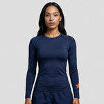 model wearing Cheshire Stars Netball Club Baselayer – Adult