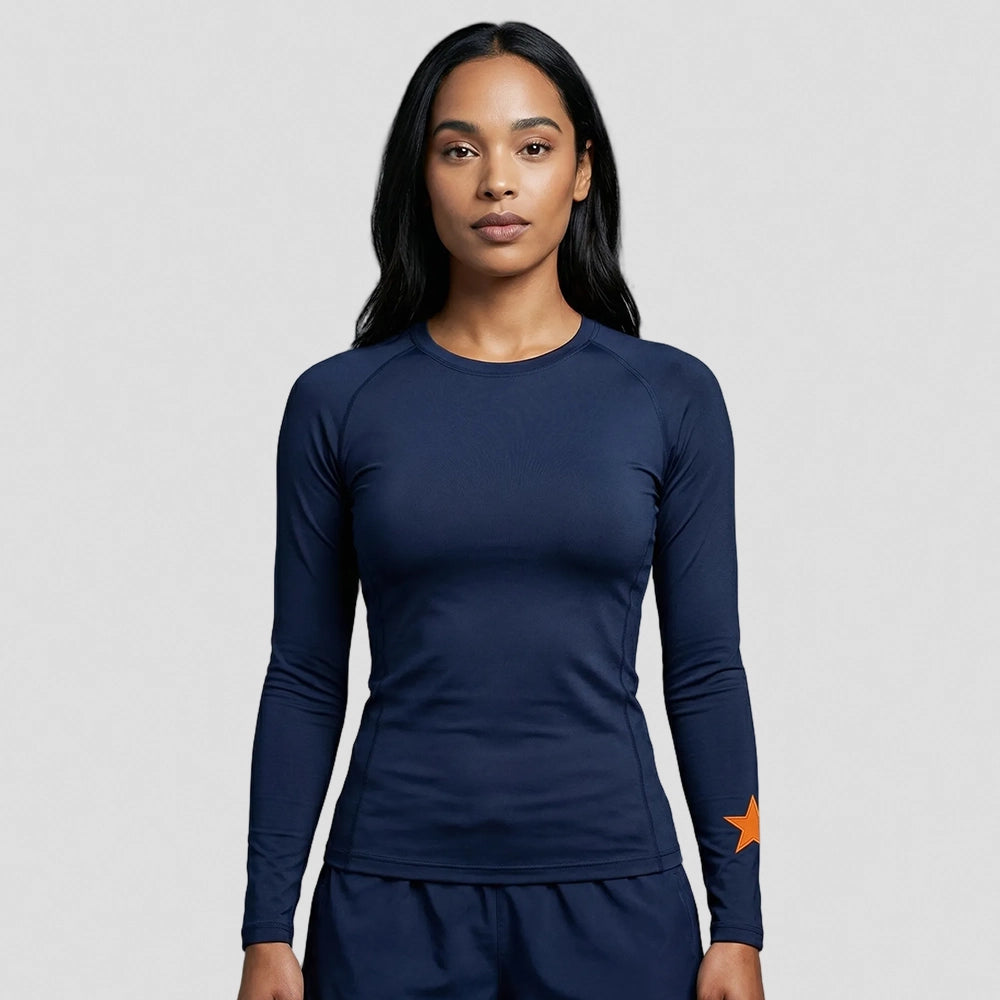 model wearing Cheshire Stars Netball Club Baselayer – Adult