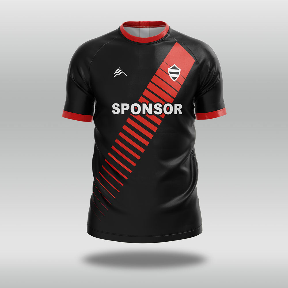 Black football shirt with red accents and a sponsor logo on a gray background