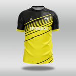 Black and yellow football shirt with a sponsor logo on a gray background