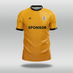 Yellow football shirt with black accents on a gray background