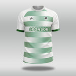 White football shirt with green stripes and a visible sponsor logo on a gray background