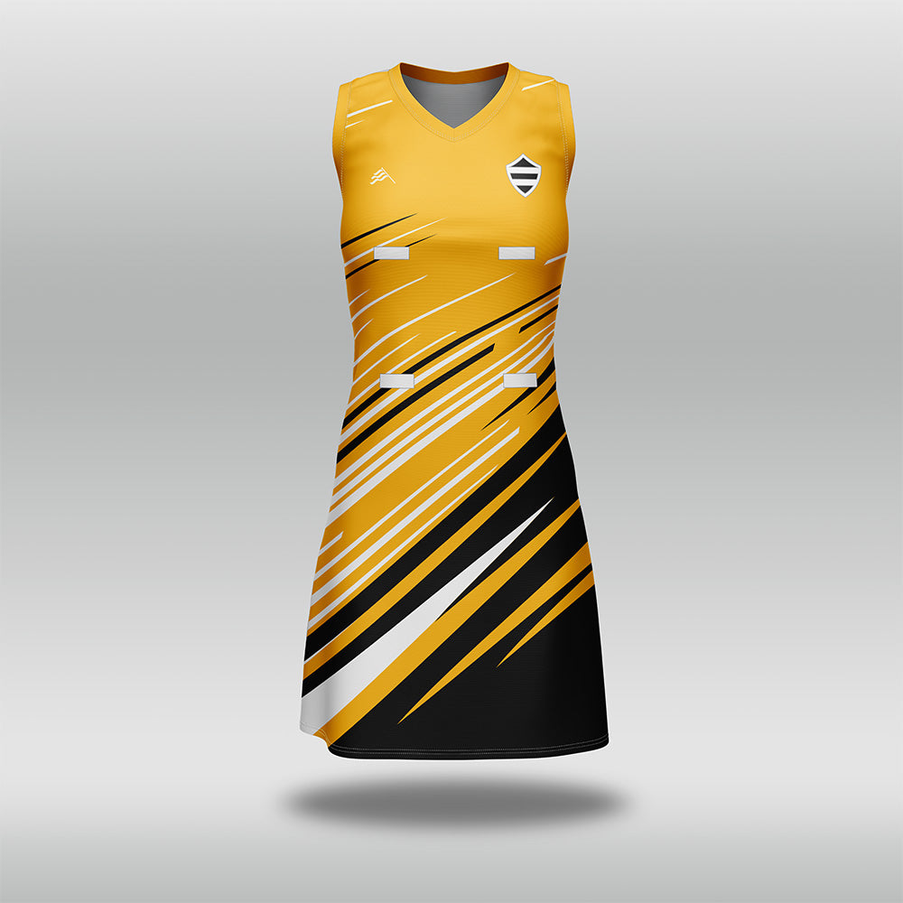 Yellow and black sports dress with a geometric pattern on a gray background