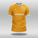 Yellow football shirt with 'SPONSOR' text on a gray background