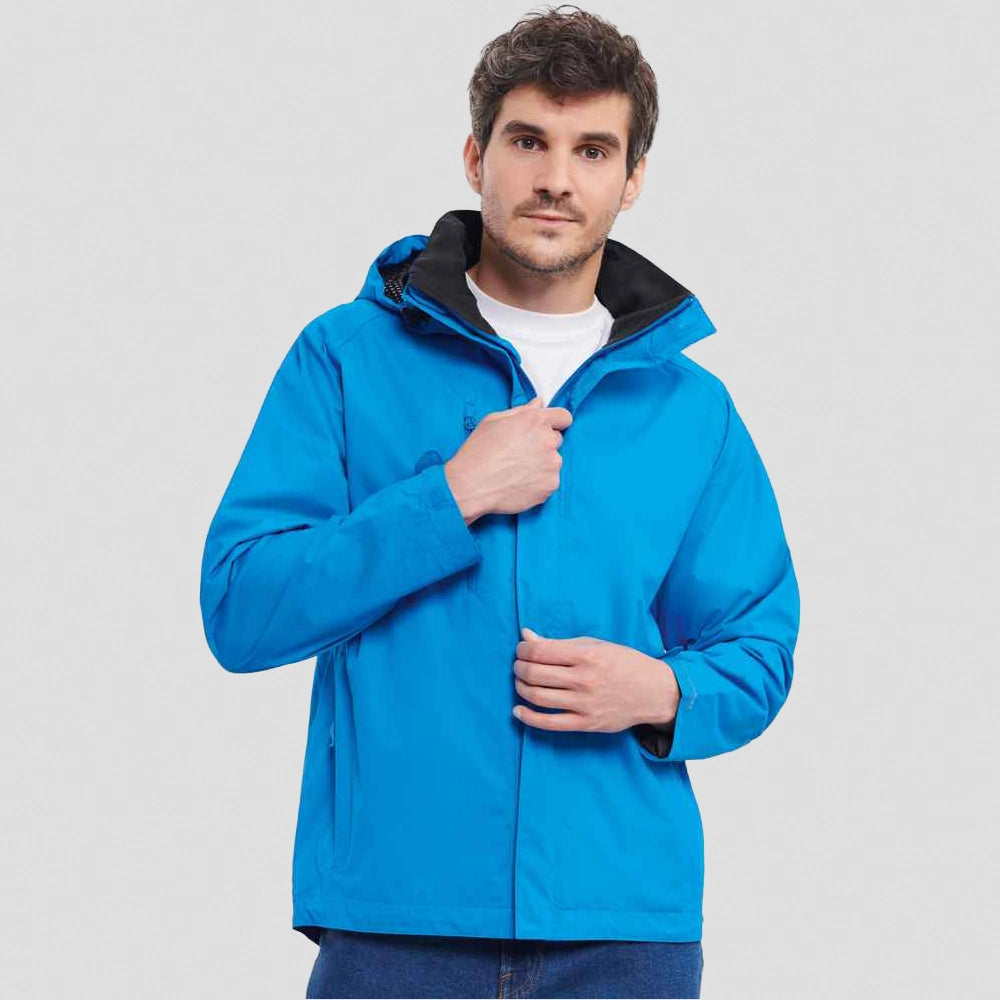 A model wearing a azure Russell HydraPlus 2000 Jacket