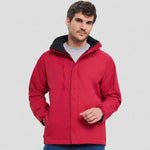 A model wearing a red Russell HydraPlus 2000 Jacket