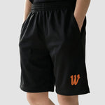 Model wearing the Winsford ASC Leisure Shorts – Junior (unisex)