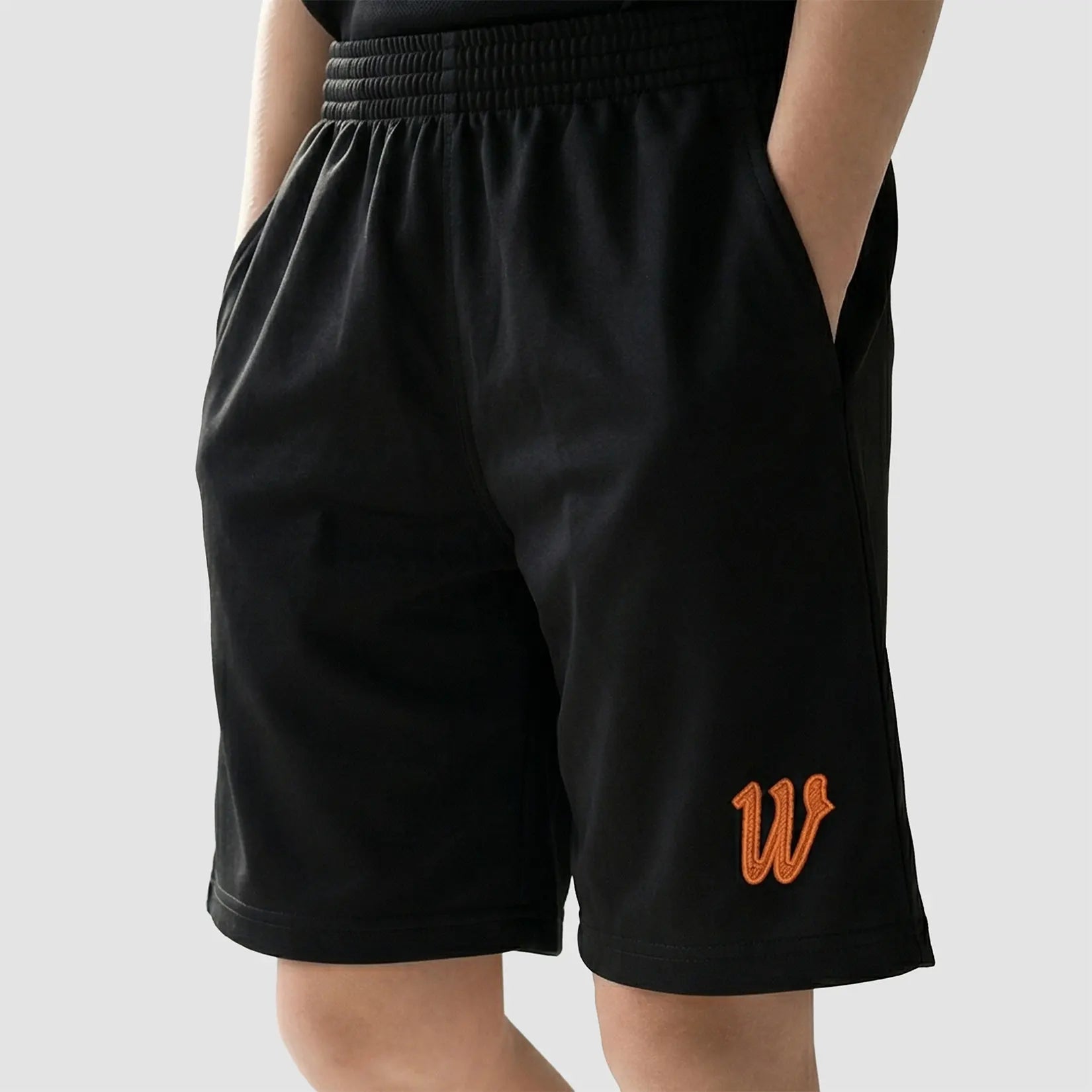 Model wearing the Winsford ASC Leisure Shorts – Junior (unisex)