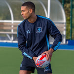 model wearing Impact Rugby Shorts in navy