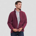 model wearing Russell Outdoor Fleece Jacket in burgundy