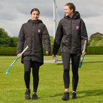models wearing Edge Pro 3/4 Jacket in black carrying hockey sticks