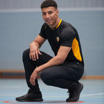 model wearing Tapered Stretch Stadium Pant black