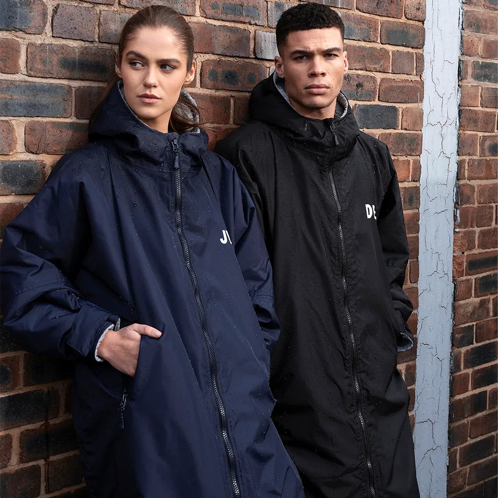 models wearing Weatherproof Changing Robe (911) in black and navy