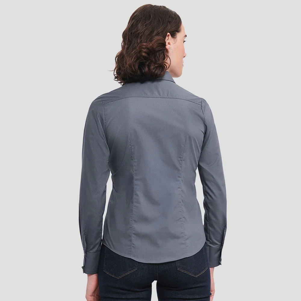 Rear view of Model wearing the Russell Collection Ladies Long Sleeve Fitted Poplin Shirt 924F in Convoy Grey