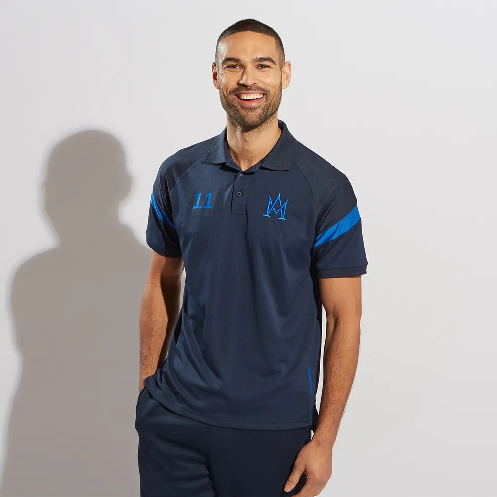 model wearing Kinetic Sports Tech Polo Navy Royal