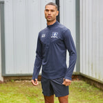 model wearing Premium Stretch Midlayer and shorts in navy