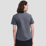 Rear view of Model wearing the Russell Collection Ladies Short Sleeve Easy Care Poplin Shirt 935F in Convoy Grey