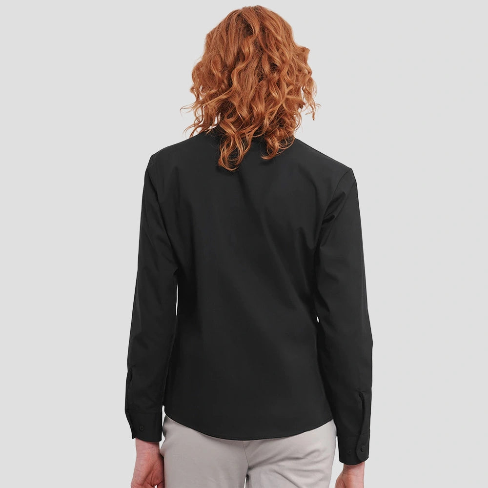 Rear view of model wearing the Russell Collection Ladies Long Sleeve Easy Care Cotton Poplin Shirt 936F in Black