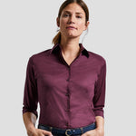 Model wearing the Russell Collection Ladies 3/4 Sleeve Easy Care Fitted Shirt in Port
