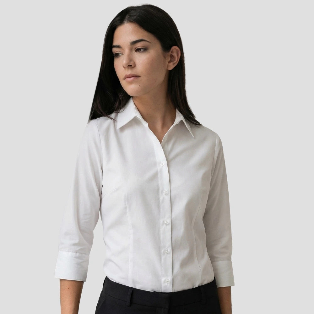 Model wearing the Ladies' 3/4 Sleeve Poly Cotton Easy Care Fitted Polin Shirt in white