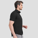 Side angle of Model wearing the Russell Collection Short Sleeve Easy Care Fitted Shirt 947M in Black