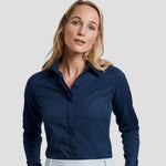 Model wearing the Russell Collection Ladies Ultimate Stretch Shirt 960F in Navy