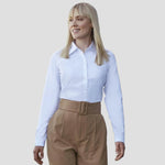 Model wearing the Russell Collection Ladies Long Sleeve Herringbone Shirt in White