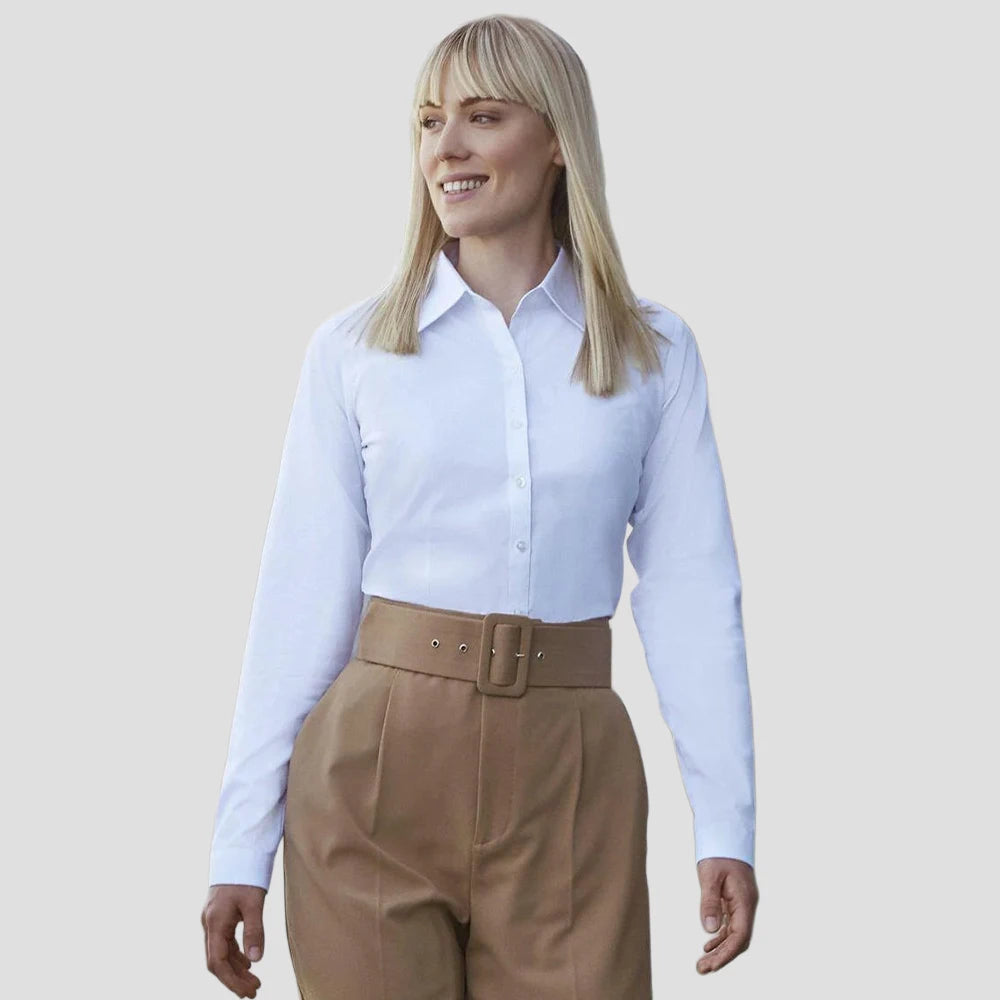 Model wearing the Russell Collection Ladies Long Sleeve Herringbone Shirt in White