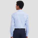 Rear view of Model wearing the Russell Collection Long Sleeve Herringbone Shirt 962M in Light Blue