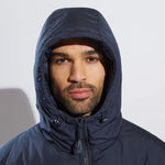 model wearing Chevron Puffer Jacket (980) with hood up