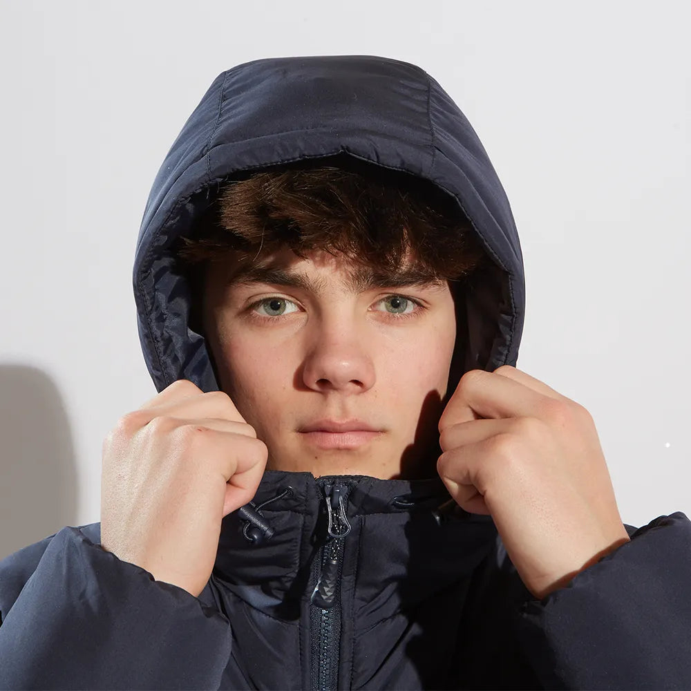 model wearing Chevron Puffer Coat (987) with hood up